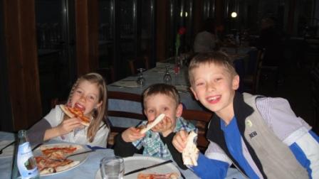 Meg, Ned and Will enjoying Pizza