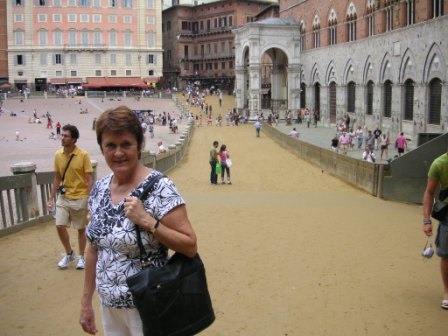 Liz standing on the track for the Palio in the Piazza del Campo