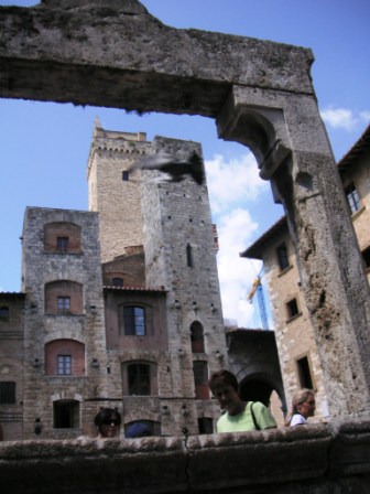 Village well and two of the many towers in San Gimignano