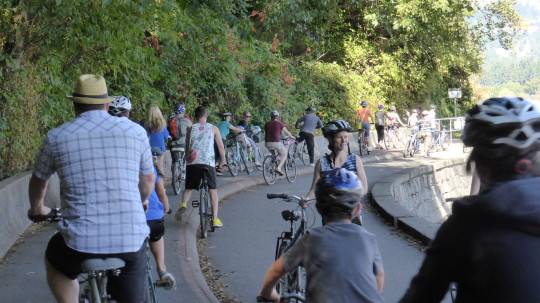 Cyclists on the Seawall cycle path in Stanley Park